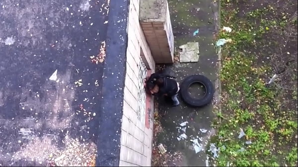 A cuckold watches his wife get fucked behind their house