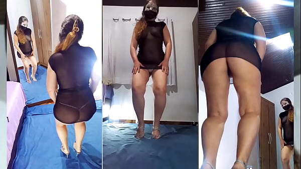 Ausziehen, schwarzes transparentes Kleid und Kristallhöschen